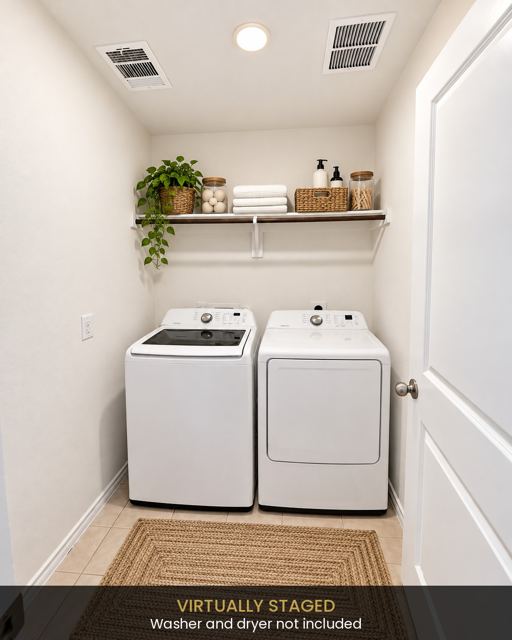 Laundry room, virtually staged. Washer and dryer not included (virtually staged photo, furniture and decor added digitally)